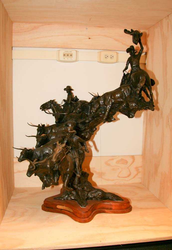 Bronze casting depicting rider o