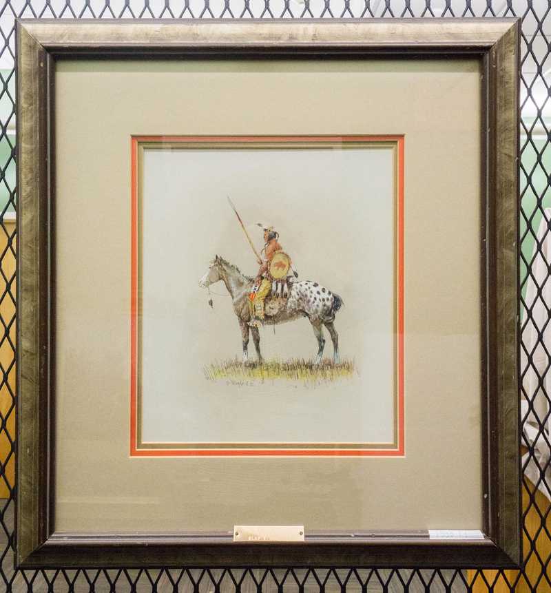 Depicts American Indian on horse