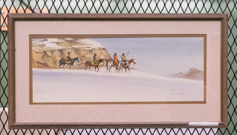 Depicts American Indians on hors