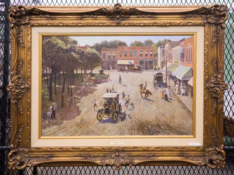 Depicts town square with riders