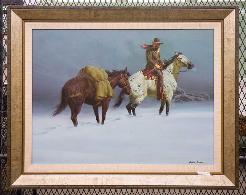 Depicts man on horseback guiding